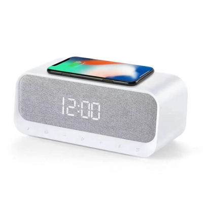 Multifunctional alarm clock with USB and wireless smartphone charger, built-in radio and Bluetooth speaker